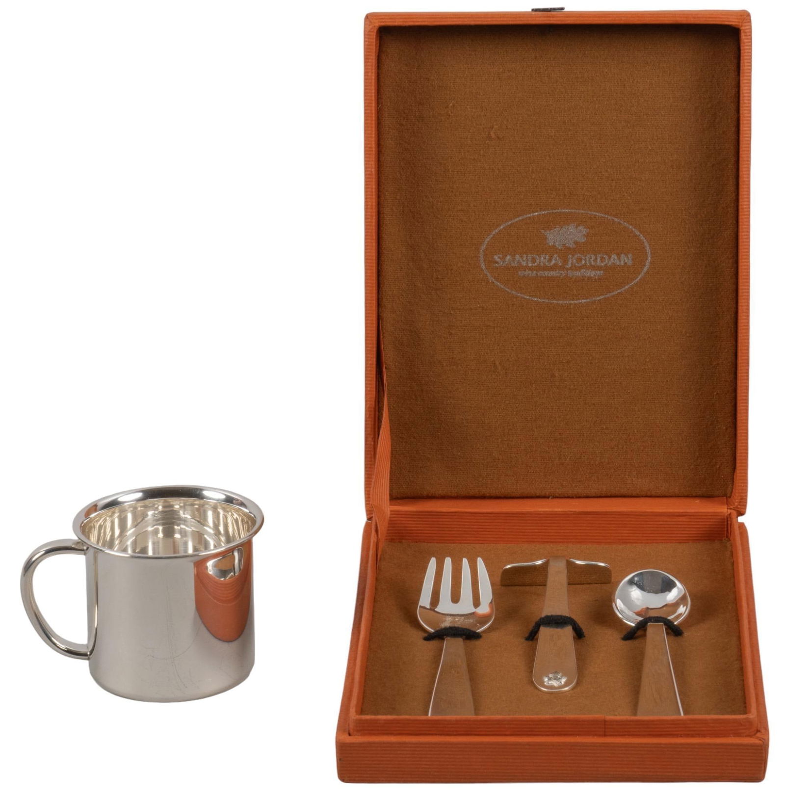 .950 Silver Child's Set and Cup by Sandra Jordan: .950 silver child's set and cup, by Sandra Jordan, includes spoon, fork, table crumber, all marked on base with stamped oak leaf, hallmarked "SJC" and "950", both encircled in oval