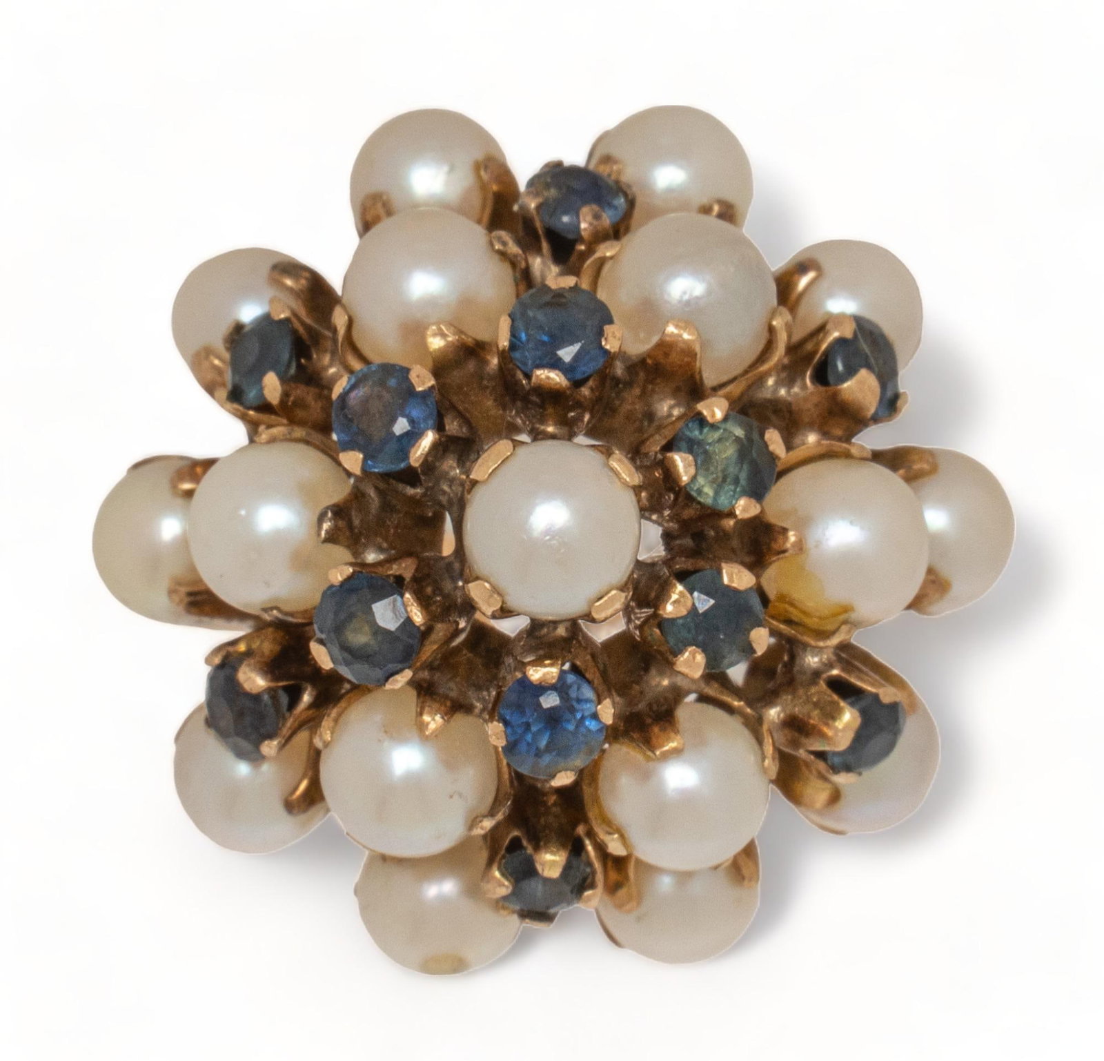 18K Gold Sapphire and Pearl Ring: 18K gold sapphire and pearl ring, swirl basket, marked size: 5.5 total weight: 9.9 grams Provenance: Property from the estate of a San Antonio, Texas lady Shipping available for this lot through our p
