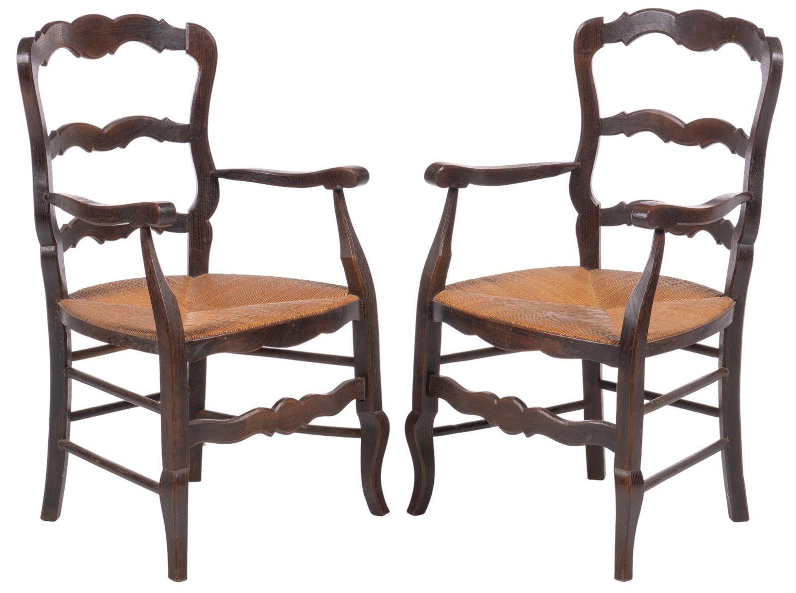 Pair of French Style Ladder Back Chairs: Pair of French style ladder back chairs of carved wooden frame with rush sheets supported on cabriole legs with stretchers height 37 in. x width 20.5 in. x depth 19.5 in. / each Shipping available for