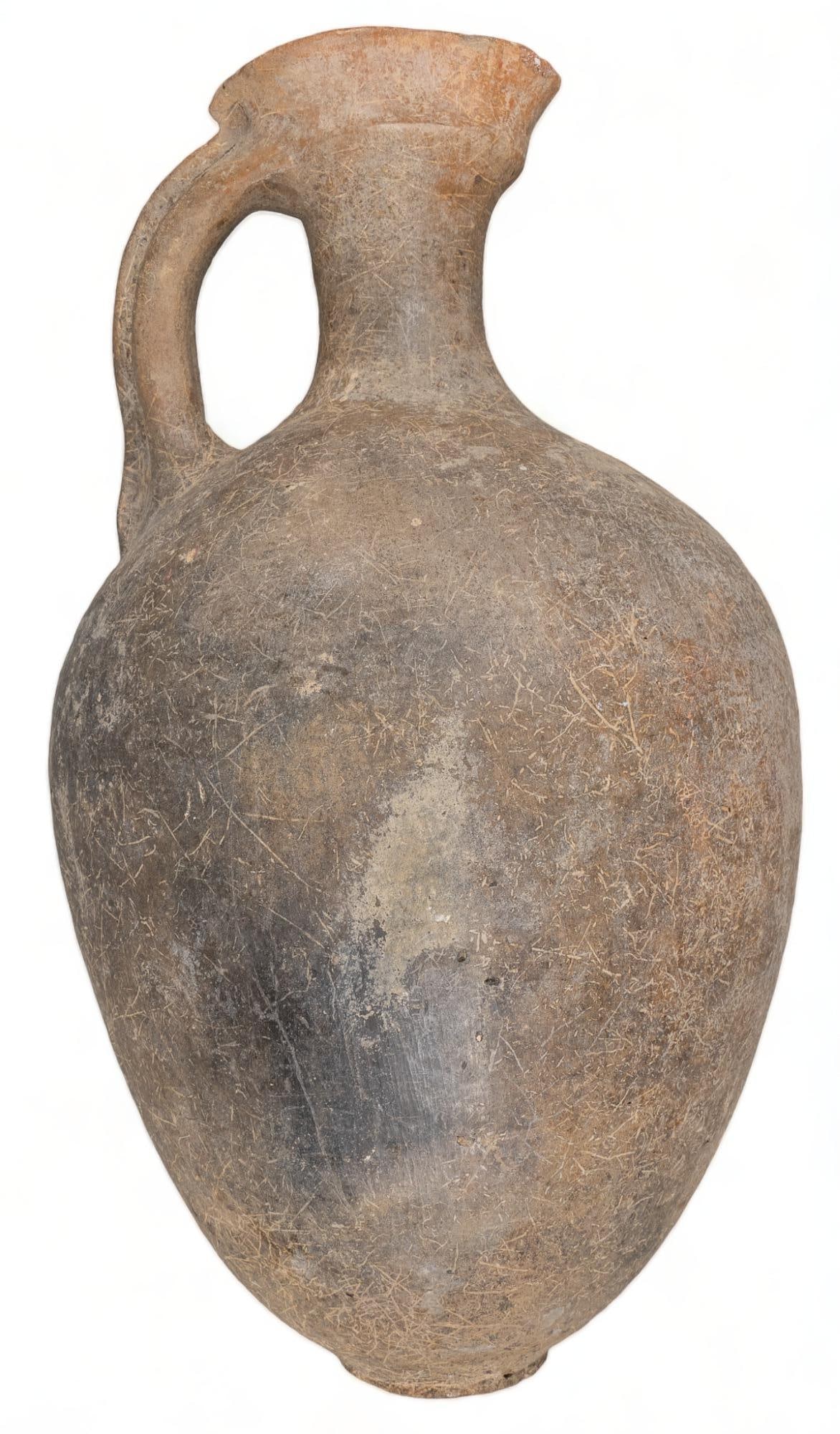Ceamic Amphora Display: Ceramic amphora display, reproduction, signed on base height 16 in. x diameter 8.5 in. Note: Does not stand on its own Provenance: Property from the collection of Francie Whittenberg, Terrell Hills