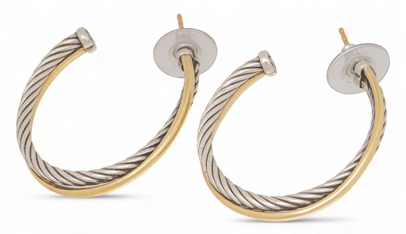 David Yurman Sterling Silver and 18K Twisted Hoops: David Yurman sterling silver and 18K yellow gold twisted hoops, rope motif twist, marked length 33 mm. total weight: 11.2 grams Provenance: Property from the estate of a San Antonio, Texas gentleman S