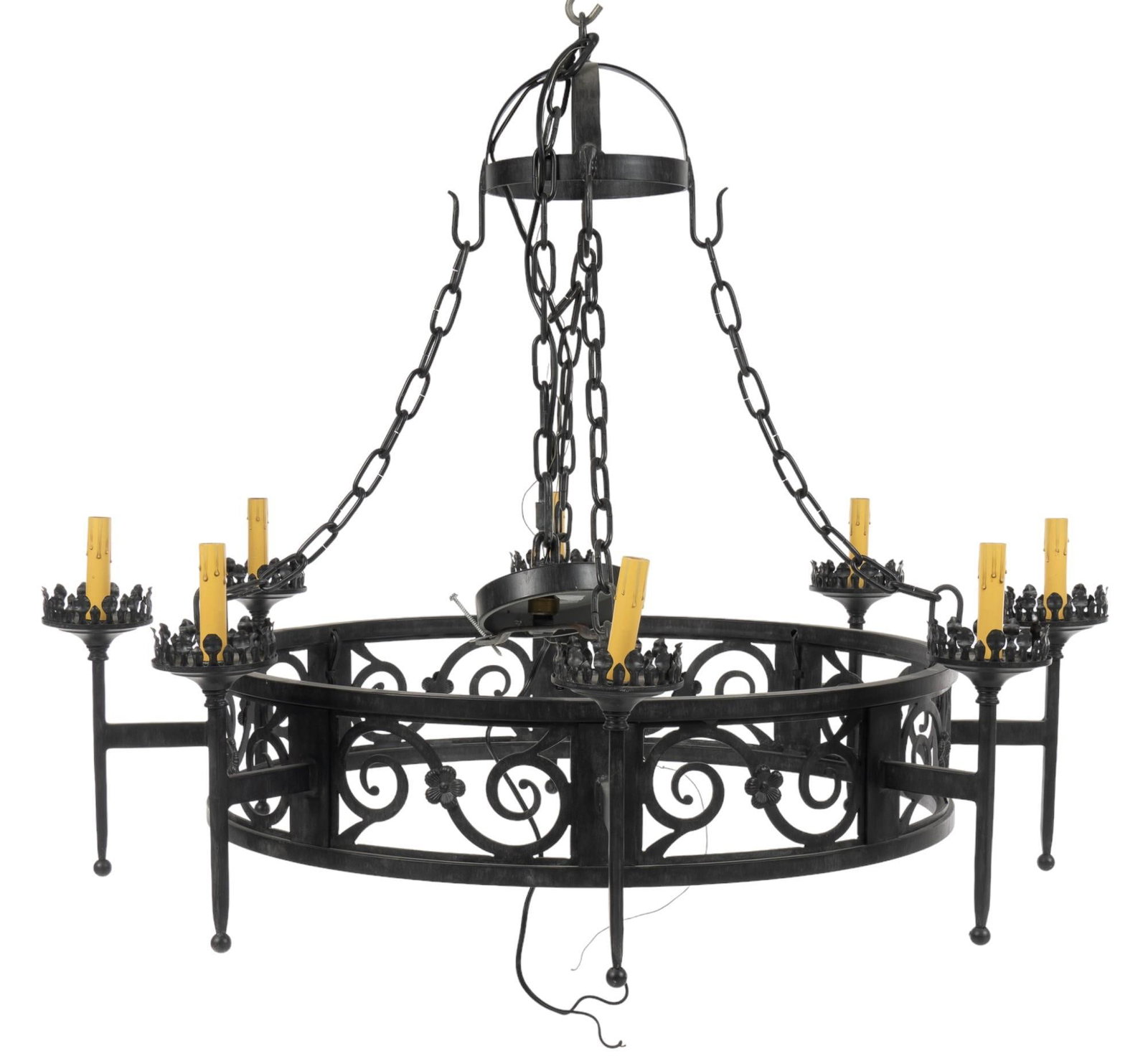 Hacienda Style Iron Chandelier: Hacienda style iron chandelier, with circle frame, scrolled accents, supporting eight lights chandelier height 14 in. x diameter 42 in. fully extended length including chain 56 in. Provenance: Former 