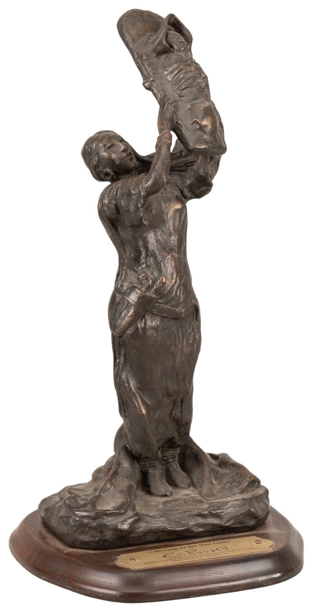 C. M. Russell, "Offering", Resin Sculpture: Charles M. Russell, "Offering to the Sun Gods", resin sculpture on wooden base, reproduction modeled after the original by Charles Russell height 14 in. x width 7.5 in. x depth 7 in. Provenanc
