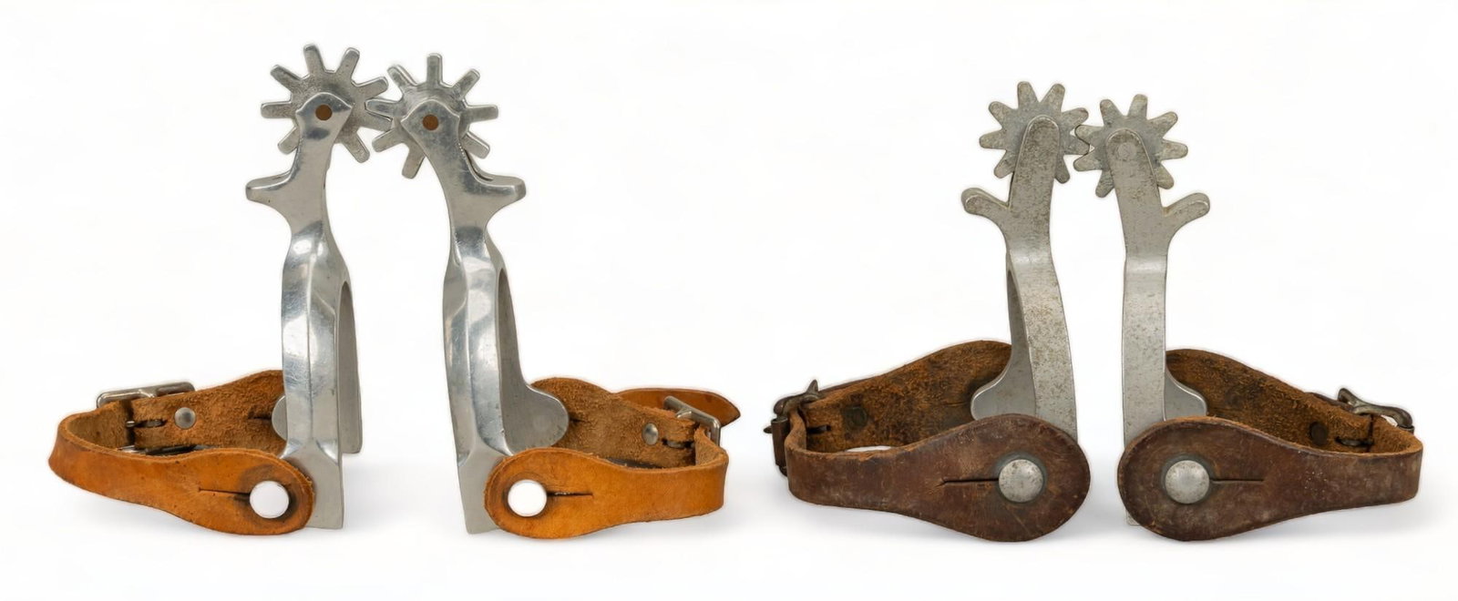 (2) Pairs of Aluminum Spurs: Two pairs of mid-century era spurs of aluminum hardware, with leather straps shank length 5.5 in. x heel width 3.5 in. rowel diameter 1.5 in. Provenance: Property from a home in the Alamo Heights neig