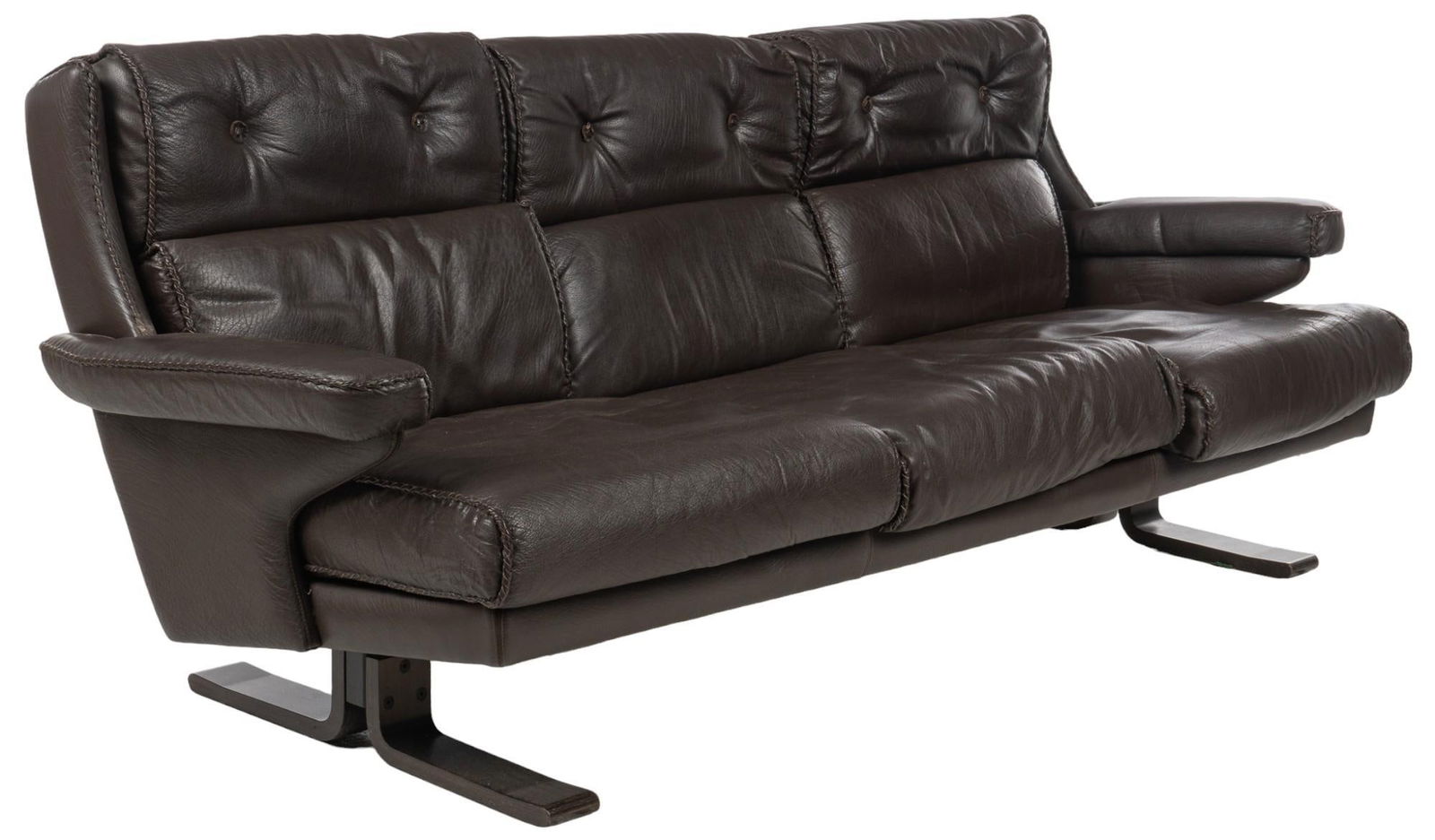 Danish Mid-Century Leather Sofa: Arne Norell (Sweden) mid-century sofa, featuring three seats with cushioned seat and backrest with black leather upholstery with stitched border accents, supported on wood legs height 31.5 in. x wid