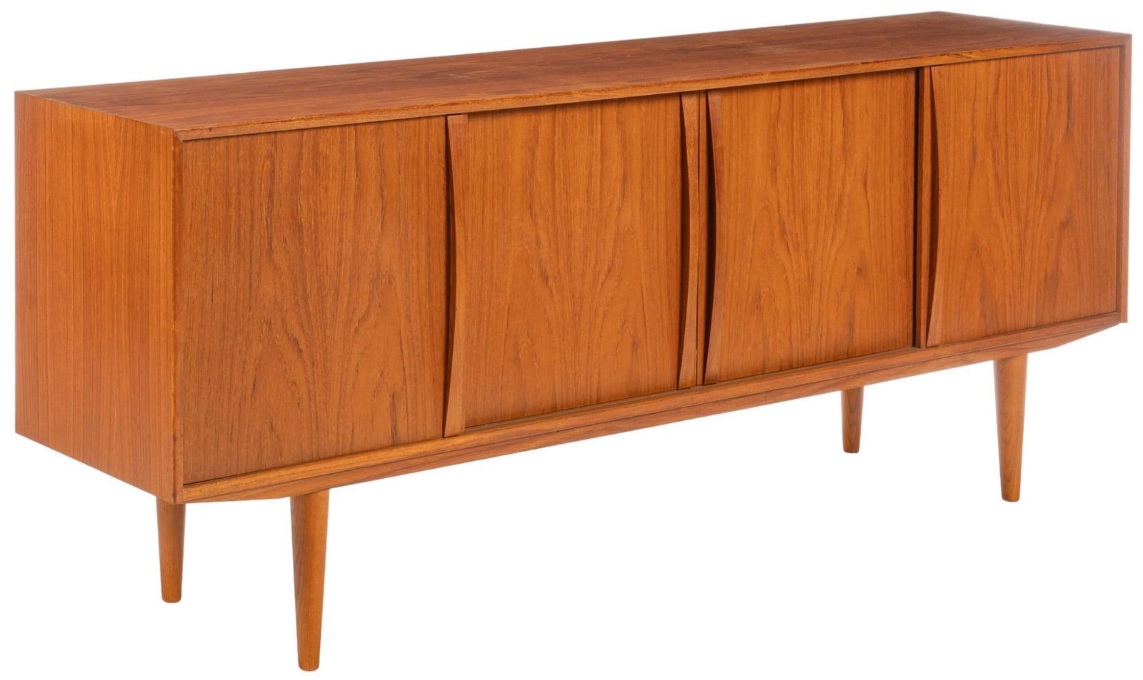 Danish Mid-Century Buffet: Danish mid-century buffet / credenza with four cabinet doors with carved pulls that slide to reveal shelved interior storage spaces within left, and middle section, with two trays lined with green fel