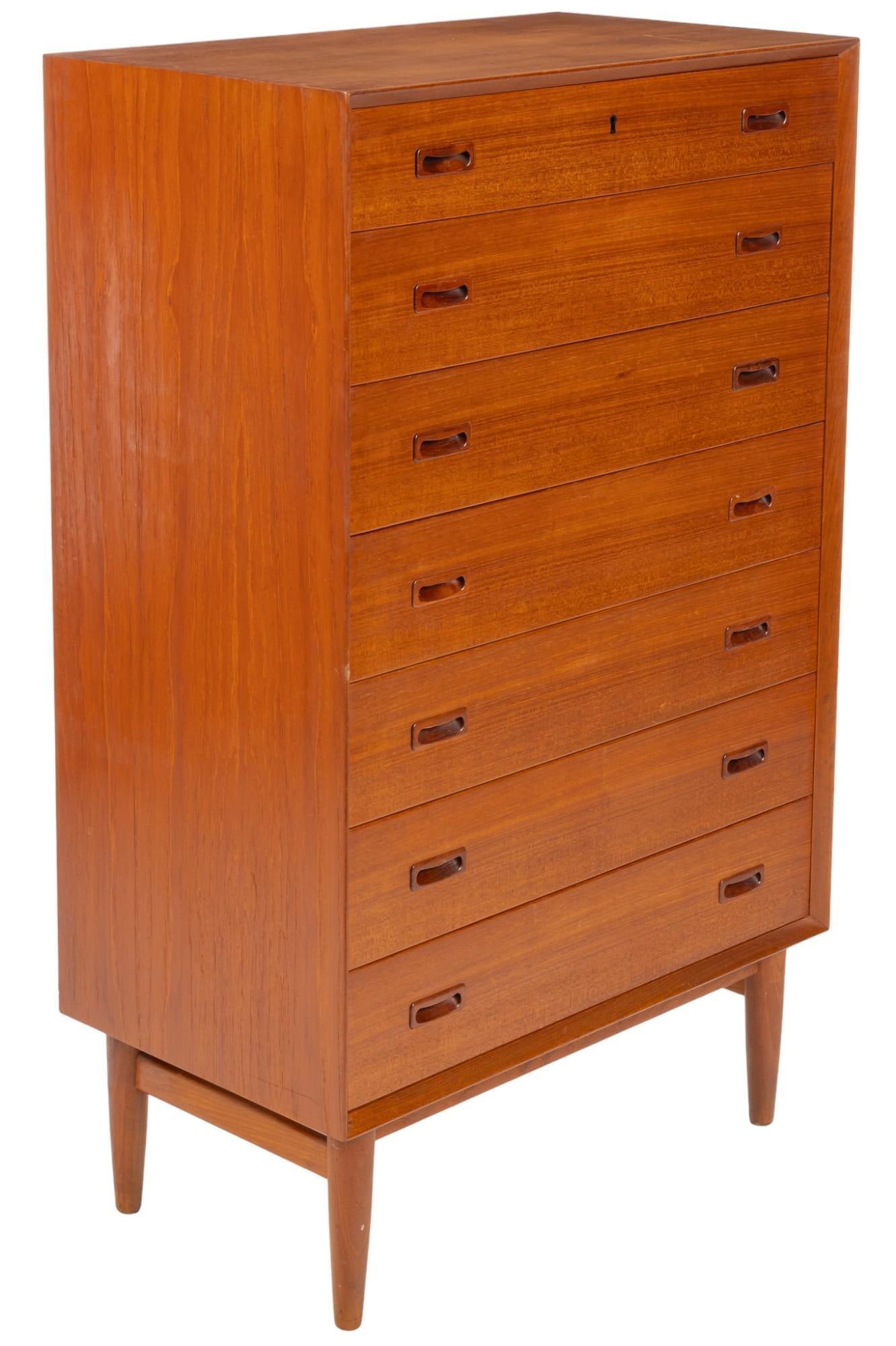 Omann Jun Mobelfabrik (DNK) Mid-Century Chest of Drawers: Omann Jun Mobelfabrik (Denmark) model no. 128, mid-century stack of seven drawers with integrated wood pulls, supported on pin legs, marked on back height 51.25 in. x width 31.5 in. x depth 18 in. S