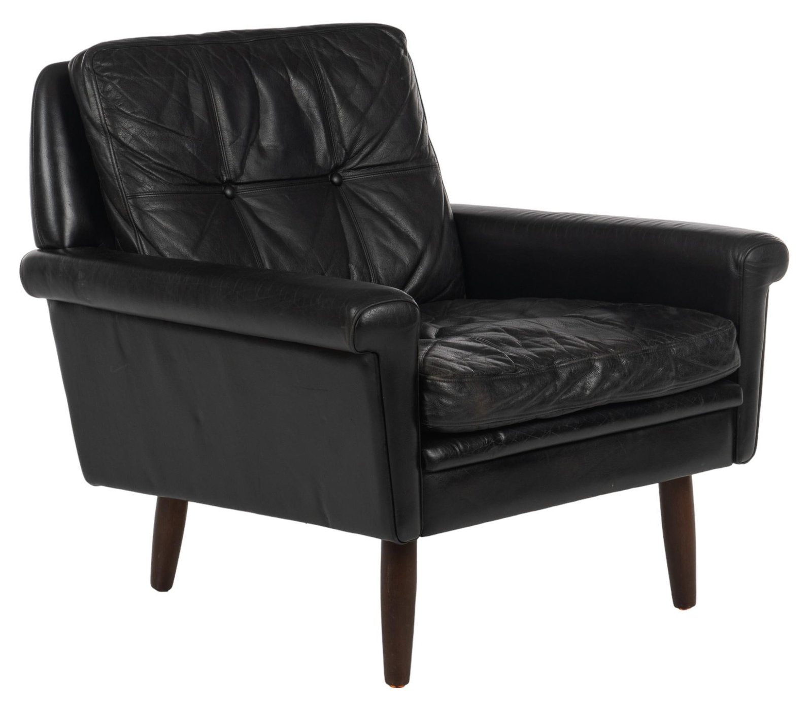 Mid-Century Leather Armchair: Danish mid-century arm chair of black leather with tufted cushions, rising on pin legs height 29 in. x width 29.5 in. x depth 29 in. Shipping available for this lot through our partner 4CL; please req