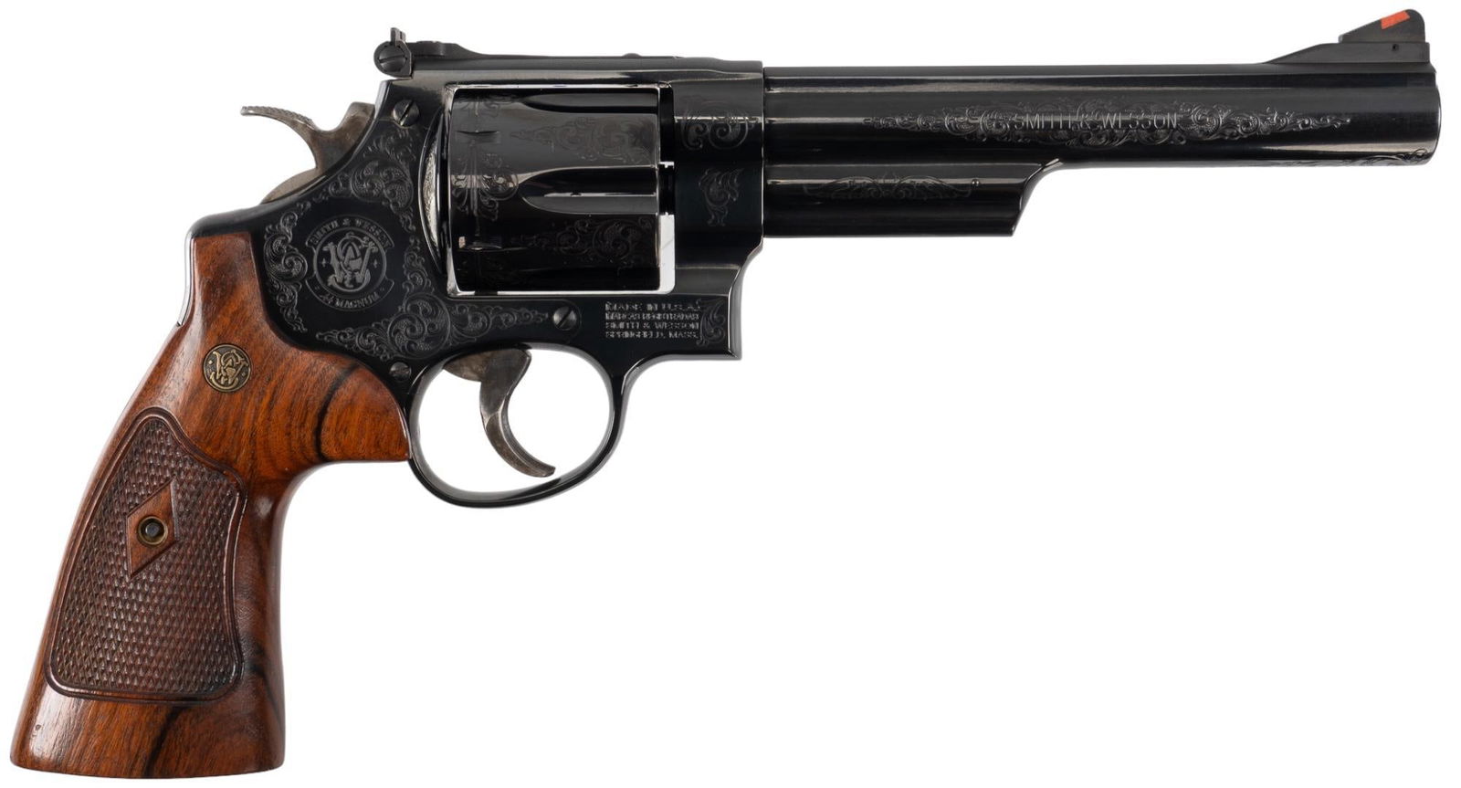Factory Engraved Smith & Wesson 29-10 44 Magnum Revolver: Serial: DAS1095 Manufacturer: Smith & Wesson Model: 29-10 Caliber: 44 Magnum Barrel length: 6.5 in. OAL: 12 in. Condition: Excellent; wood grips have light handling marks; barrel, frame & cyli