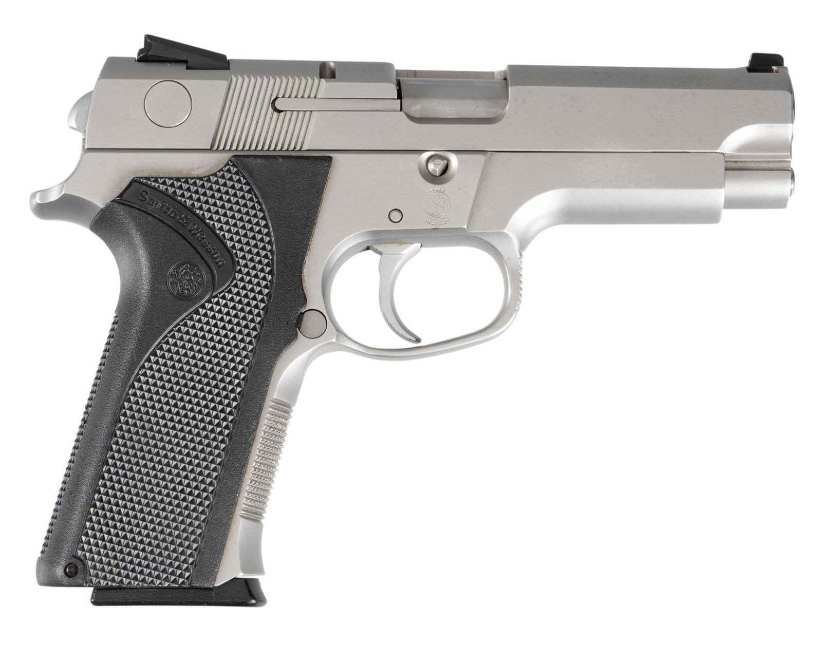 Smith & Wesson Model 4046 40S&W Semi Auto Pistol: Serial: TZJ2500 Manufacturer: Smith & Wesson Model: 4046 Caliber: 40S&W Barrel Length: 4 in. OAL: 7.75 in. Condition: Good; plastic grips have light handling marks; slide & frame have lig