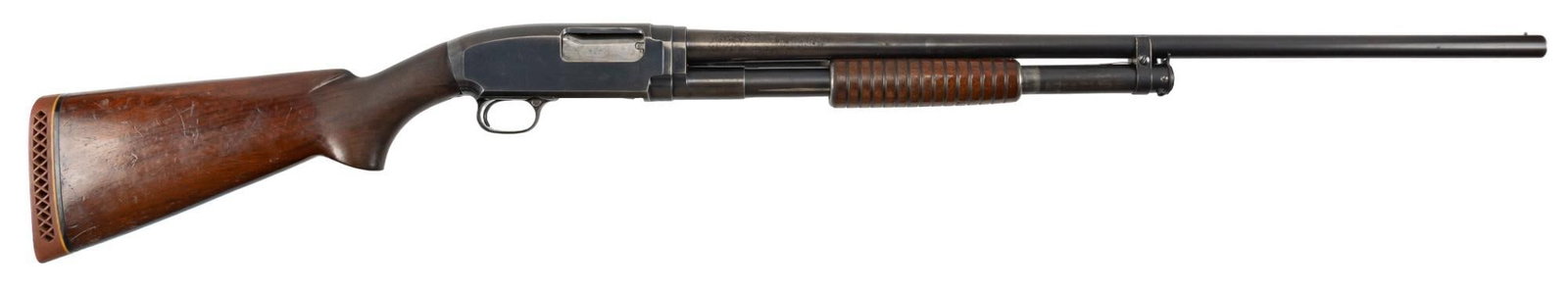 Winchester Model 12 16 Gauge Pump Action Shotgun: Serial: 873215 Manufacturer: Winchester Repeating Arms Co. (c. 1941) Model: 12 Caliber: 16 Gauge (2.75 in. chamber) Barrel length: 28 in. OAL: 46.75 in. Condition: Fair; wood stock has light wear for 