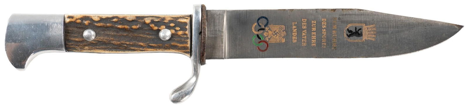 German 1936 Olympics Souvenir Youth Dagger: Manufacturer: Emil Voos, Solingen Model: Olympic Youth Dagger Blade Length: 4.75 in. Overall Length: 8.25 in. Condition: Very Good; blade has some light spots of pitting from age; original stag grips