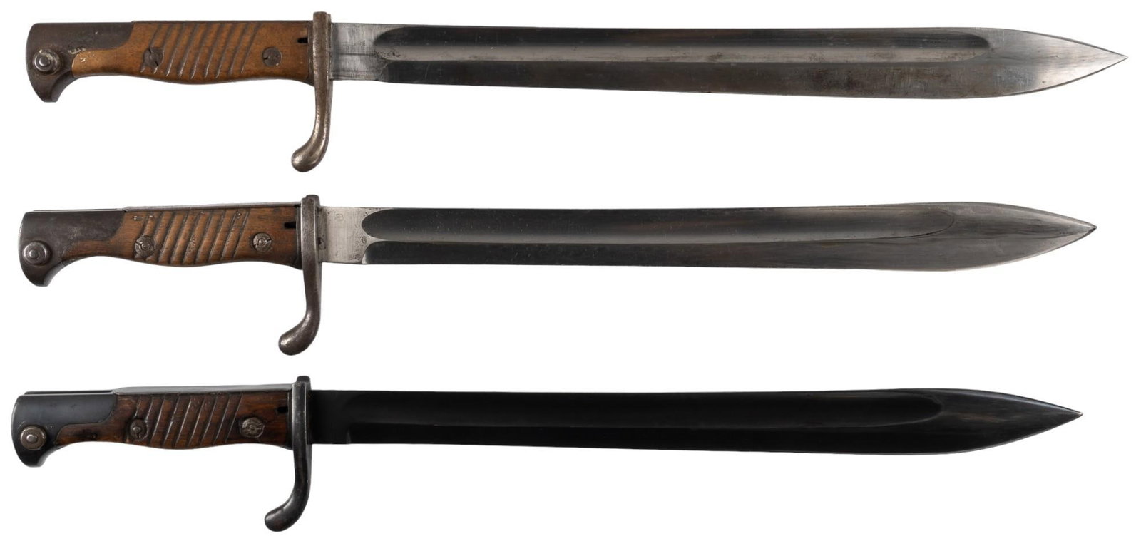 Collection of 3 German WWI 98/05 Bayonets W/ Scabbards: Manufacturer: (1) Alex. Coppel, Solingen; (2) V.C.Schilling, Suhl; (3) E&F Horster, Solingen Model: (1-3) 98/05 Butcher Marked: (1-3) dated 1917 Blade Length: (1 & 2) 14.5 in.; (3) 14.25 in. O