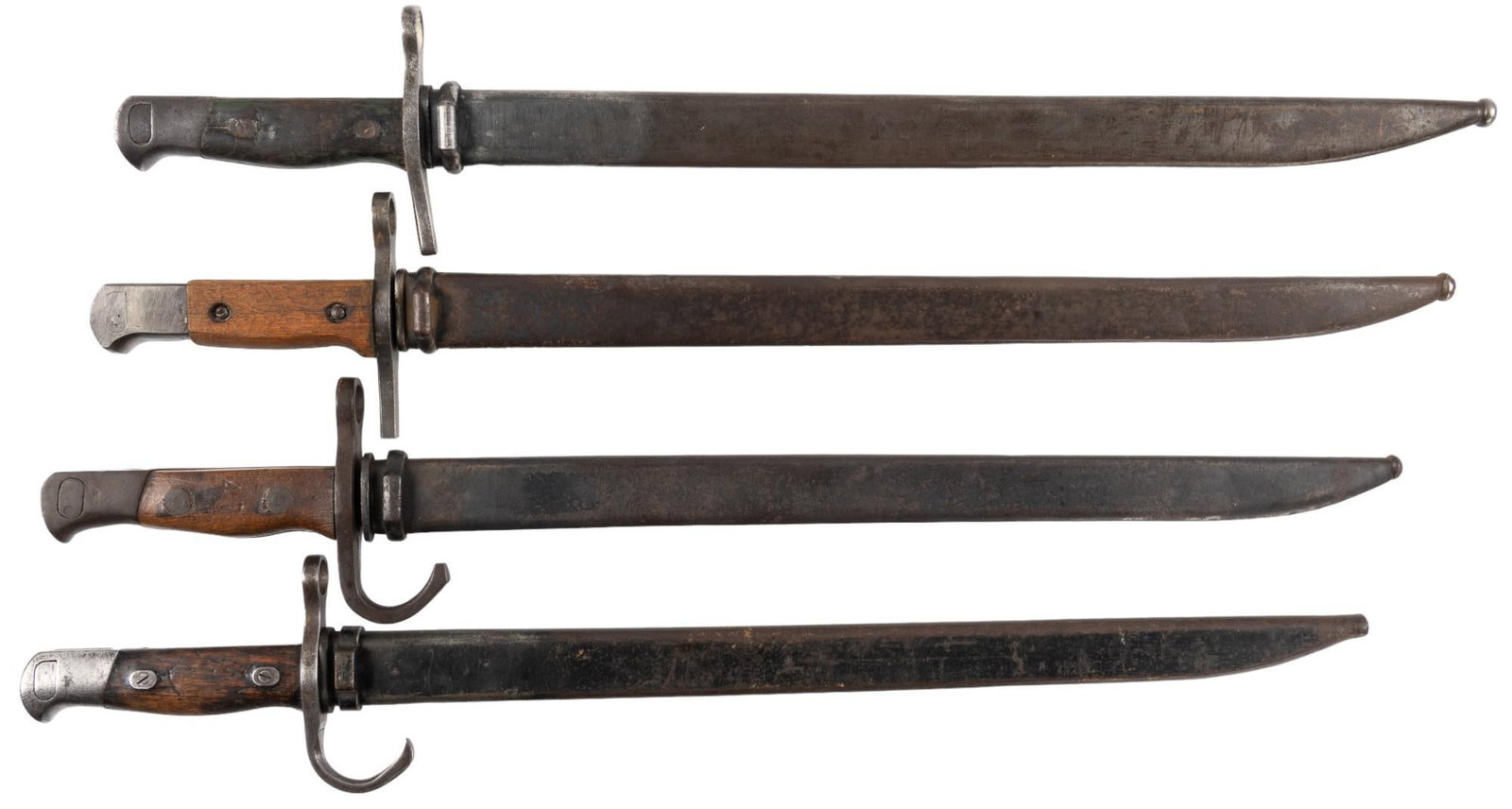 Collection of 4 Japanese WWII Type 30 Bayonets: Manufacturer: (1) Matsushika Kinzoku KK Arsenal; (2) Kaneshiro Nagoya Star K Arsenal; (3) no mark; (4) Nagoya Arsenal Model: (1 & 2) Type 30 straight guard; (3) Type 30 training; (4) Type 30 hooke
