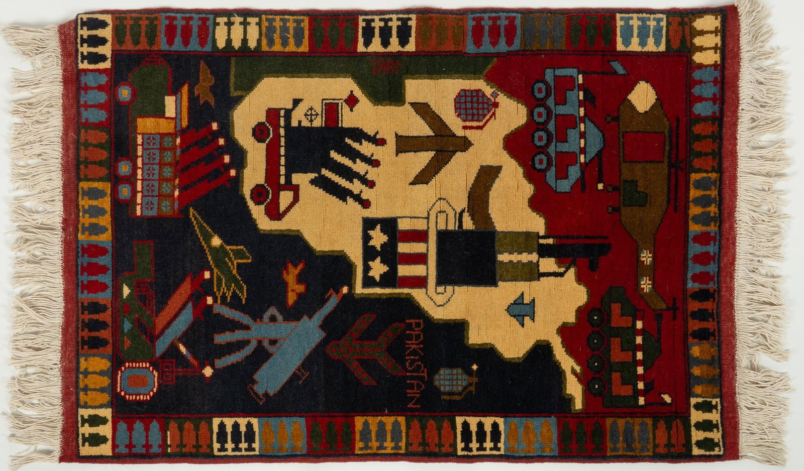 20th C. Map of Middle East War Rug: Interesting "War Rug" with map of Iran, Afghanistan & Iraq; depictions of a weapons & vehicles of war, bordered with multi-colored mortar pattern; Uncle Sam top hat with AK-47 sticking