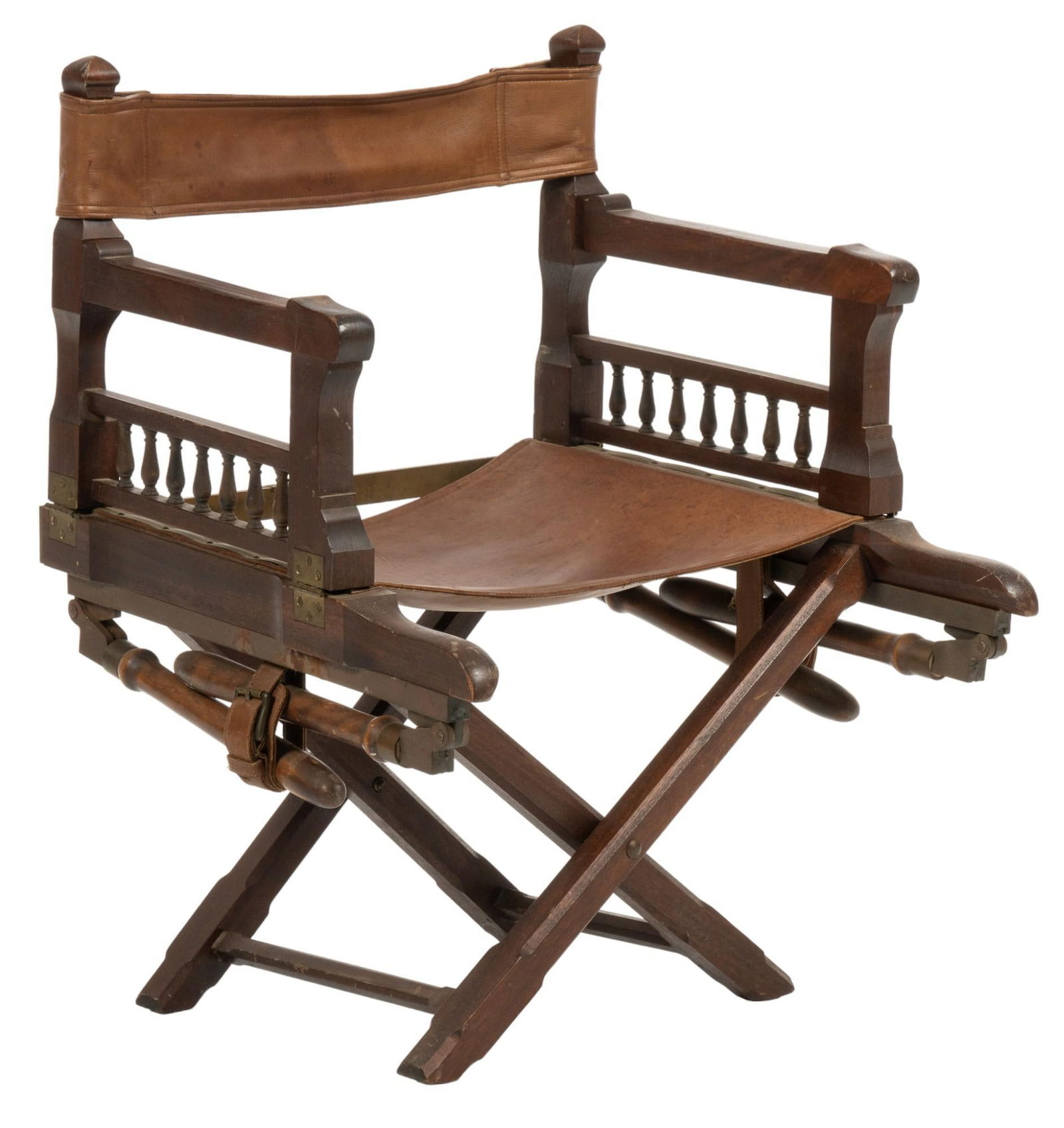 Willis & Geiger Selous Leather Campaign Chair: Manufacturer: Willis & Geiger Outfitters (c. 1980s-1990s) Model: Selous Campaign Chair Marked: w/ Willis & Geiger Outfitters brass plaque on underside of chair Measures: 29 H x 22 W x 22 D in. Conditi