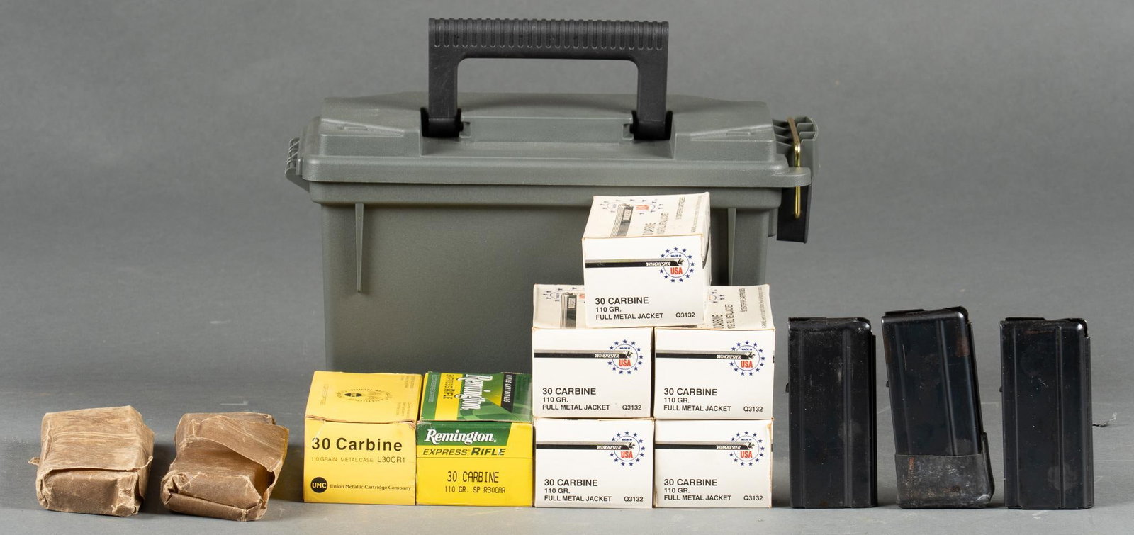 330 Rounds of .30 Carbine Ammunition & 5 Magazines: Includes: -3 x 15-rd M1 Carbine .30 magazines; A.I., I.U., SW -2 x 30-rd M1 Carbine .30 magazines; wrapped in wax paper -249 rds of Winchester .30 Carbine 110gr. FMJ -50 rds of Remington .30 Carbine 1