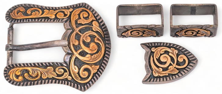 Sterling Silver with Inlay Belt Buckle and Accessories: Sterling silver belt buckle and accessories, floral motif metal inlay four piece set including buckle, belt fasteners, and decorative belt attachment, marked "925 14k" Provenance: Property fr