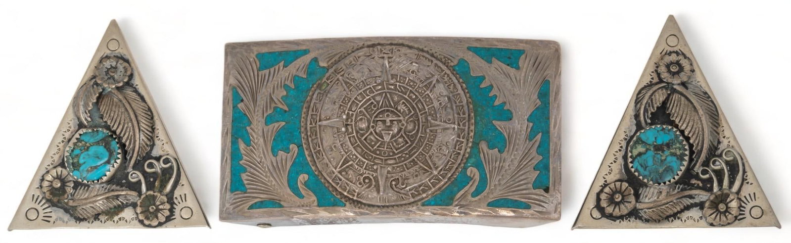 Sterling Silver Belt Buckle and Belt Accessories: Sterling silver belt buckle and belt accessories, belt buckle has turquoise inlay, floral and Aztec motifs, belt accessories have single inlaid turquoise stone, vegetal motifs, all unmarked Provenance