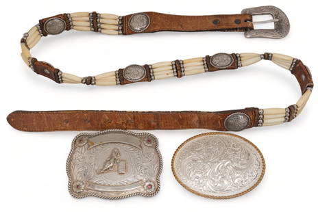 (2) Belt Buckles and Tony Lama Belt: Two belt buckles and belt, one silver platted belt with barrel racing soldered centerpiece, scalloped border and floral engraved motifs, marked "Montana silversmiths, Columbus Montana, silver plat