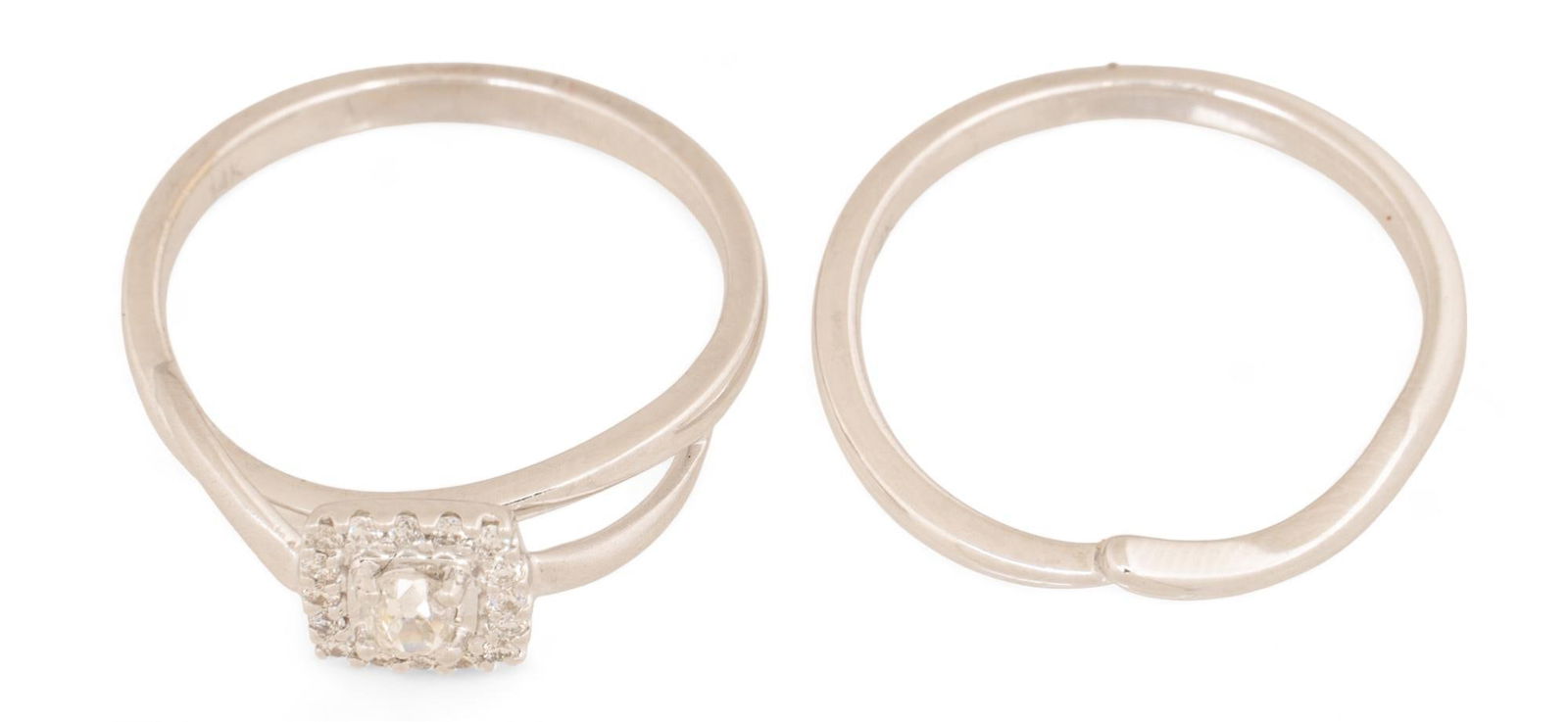 14K Gold Diamond Engagement Ring and Wedding Band: 14K gold diamond engagement ring and wedding band, diamond ring with central diamond (approx. .10 ct) with pattern of inlaid diamonds surrounding central stone (approx. .6 ct), stackable rings, size 6