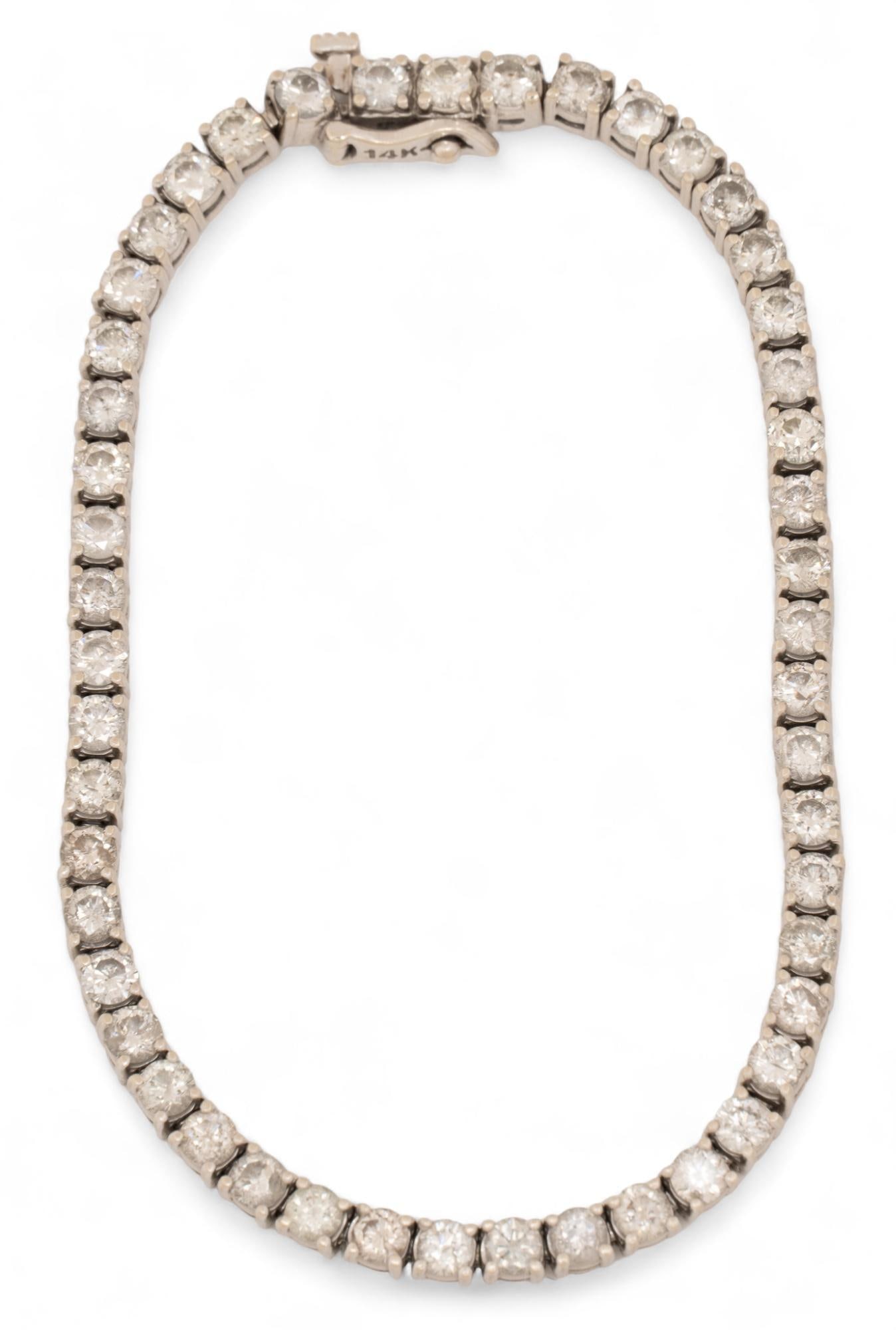 14K White Gold 4ctw Diamond Tennis Bracelet: 14K white gold diamond tennis bracelet, approx. 4 tcw, marked "14K" Circumference: 8 in *All diamond or stone details including but not limited to color, clarity, cuts, and carat weights are a