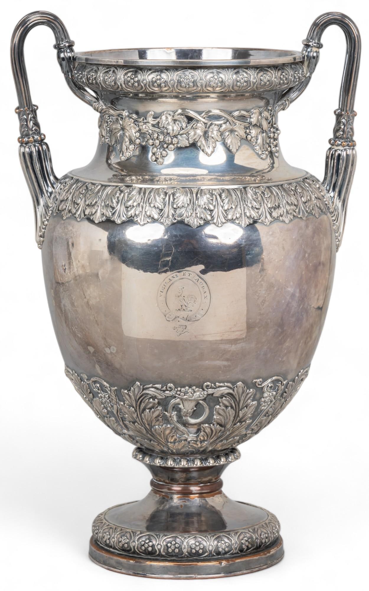 Victorian Silver Plate Champagne Cooler: Antique Sheffield plate silver on copper wine cooler with vining grape and acanthus cornucopia borders, large loop handles, inset armoral, and removable insert Height: 13.5 in Provenance: Property fro