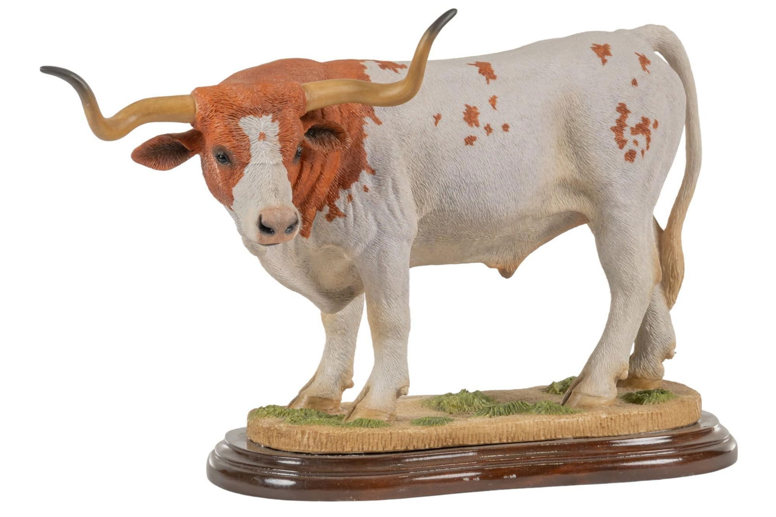 Longhorn Steer Sculpture: Longhorn steer sculpture, marked Estevez to underside, porcelain sculpture, ed. 182/950 height 12 in. x width 20 in. x depth 8 in. Provenance: Property from the monumental lifetime collection of a d