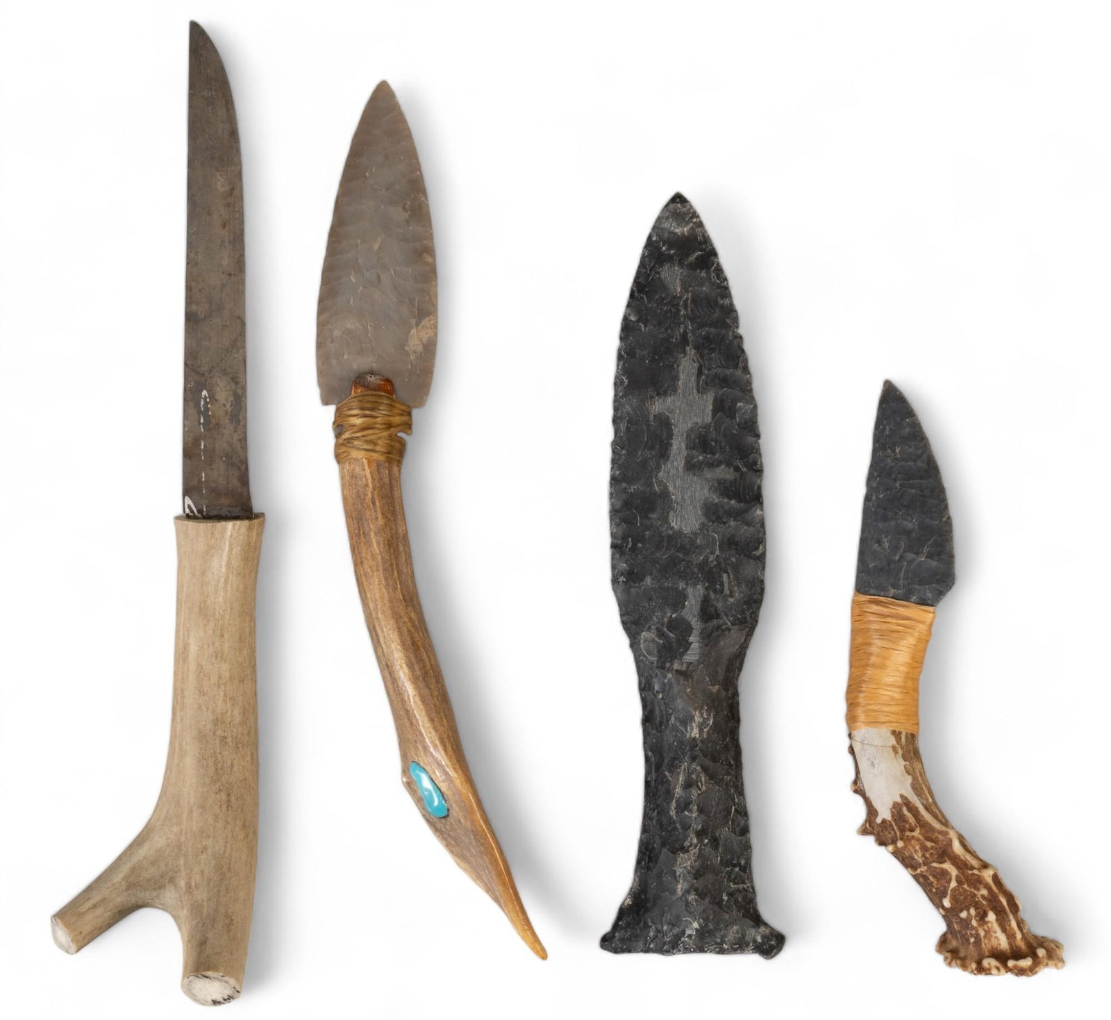 Collection of (4) Flint and Stone Knives: Collection of four flint and stone knives, two with antler handles height 11.5 in. x width 2.5 in. x depth 2.5 in. Provenance: Property from the monumental lifetime collection of a distinguished Dalla