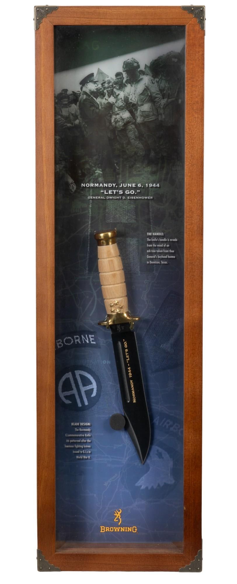 Browning Living History Normandy Commemorative Knife Display: Manufacturer: Browning Model: Living History Series: Normandy Commemorative knife #122 of 1944 Blade length: 8 in. OAL: 13 in. (case: 30 x 9 x 3 in.) Includes: wood handle is Ash Tree from General Eis