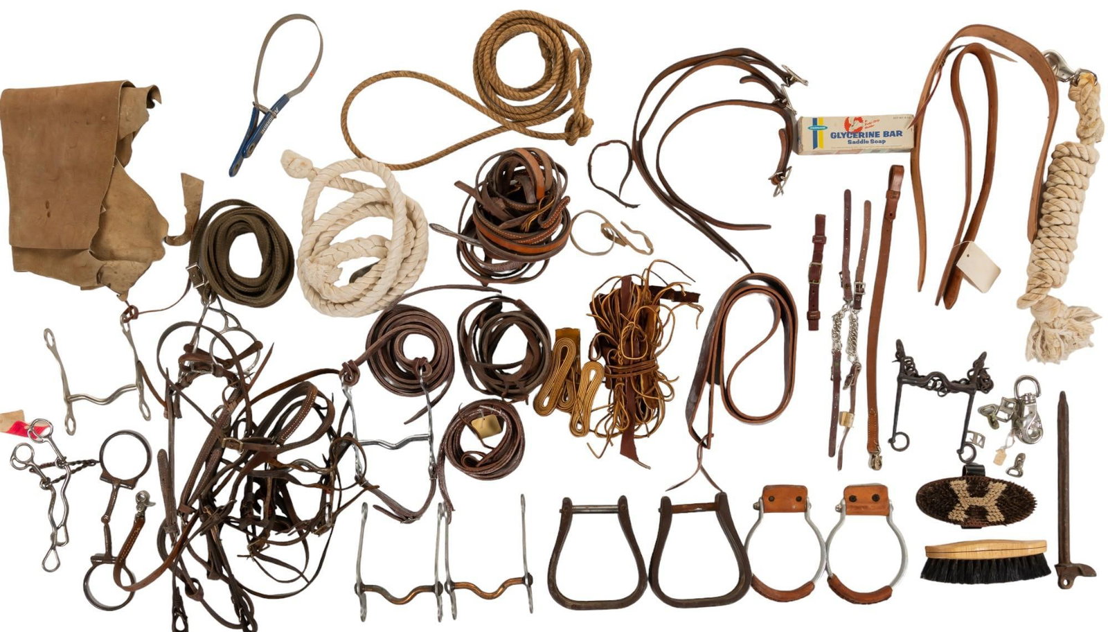 Large Collection of Horse Accessories: Large collection of horse accessories, includes, lead ropes, split reins, halters and brushes height 7.5 in. x width 7 in. x depth 3.5 in. Shipping available for this lot through our partner 4CL; plea