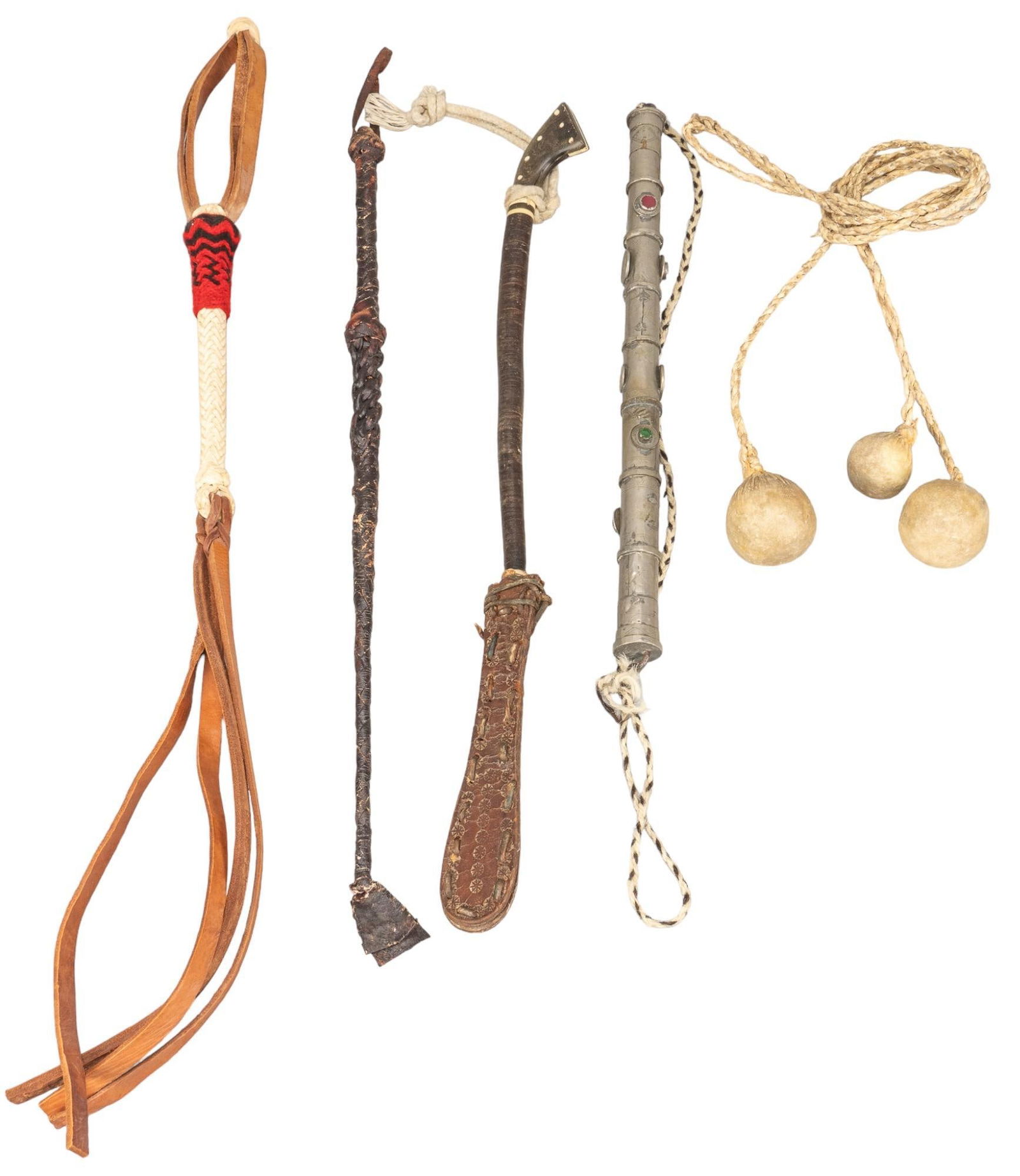 Set of Vintage Rawhide Whips and Quirts: Collection of five rawhide whips and quirts, three whips with braided and metal handles, one set of throwing bolas, on rawhide quirt, and one rawhide rope length 22 in. x width 2 in. x depth 1 in. /