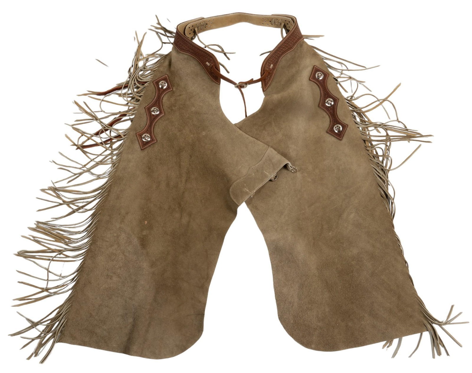 Gray Suede Chaps: Gray suede chaps with embossed leather belt detail and metal belt buckle, tassels and fringe on legs height 44 in. x width 48 in. Condition A; excellent condition, shows little signs of wear Provenanc