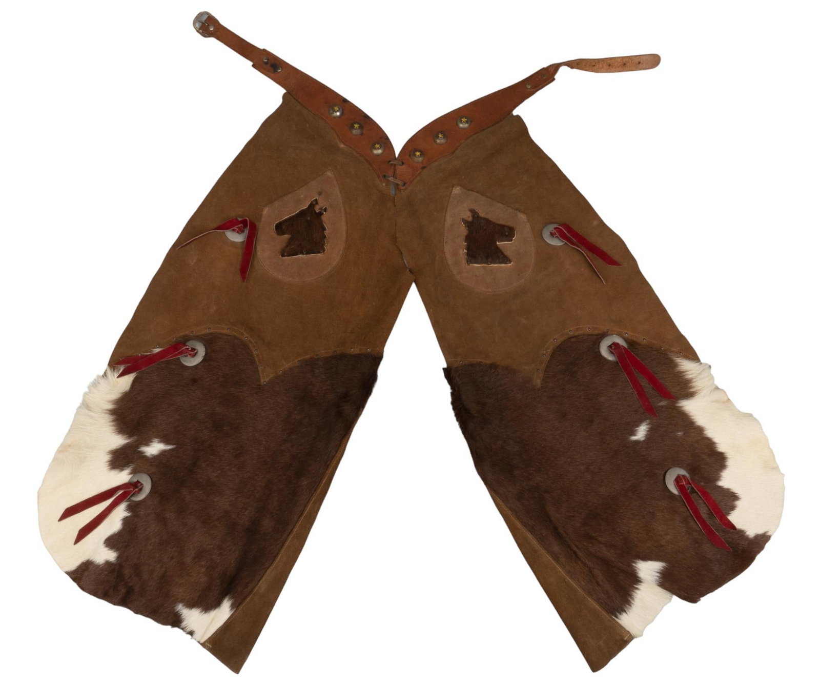 Vintage Kids Cowhide Cowboy Chaps: Vintage kids cowhide cowboy chaps, cowhide detail on bottom of leg, horse motif on top of the leg, read leather and metal conchos, metal button detail on belts pant length 26 in. x belt width 23 in. P