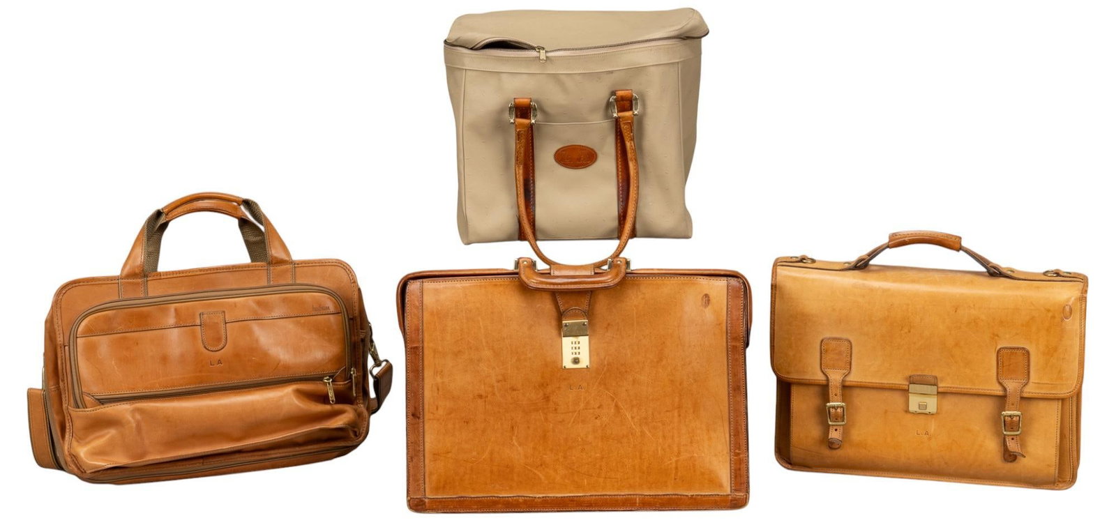 (4) Travel and Business Bag: Collection of four bags, includes one locked briefcase of brown leather, one Hartmann brand messenger bag, marked "L.A", one locked Hartmann brand brief case, and one King Ranch brand small we