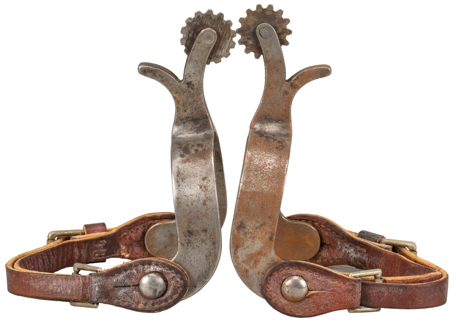 Pair of Silver Mounted Cowboy Spurs: Pair of silver mounted cowboy spurs, silver mounted geometric pattern on heel band, plain leather band, unmarked height 14 in. x width 5.5 in. x depth 4.5 in. Provenance: Property from the monumental 