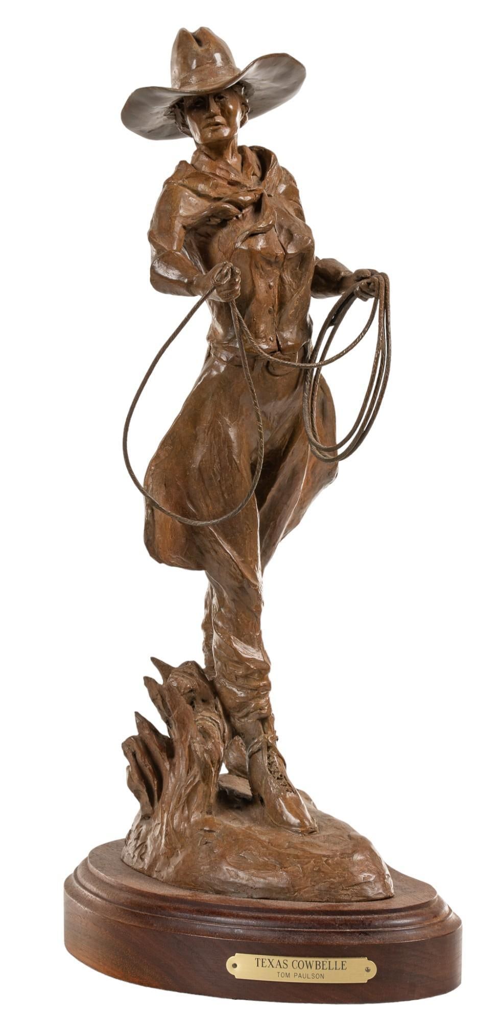 Tom Paulson, "Texas Cowbelle", 1998: Tom Paulson (Am., 20th/21st C.), "Texas Cowbelle", 1998, bronze sculpture with applied patina, ed. 4/12 height 19 in. x width 7 in. x depth 10 in. Shipping available for this lot through our p