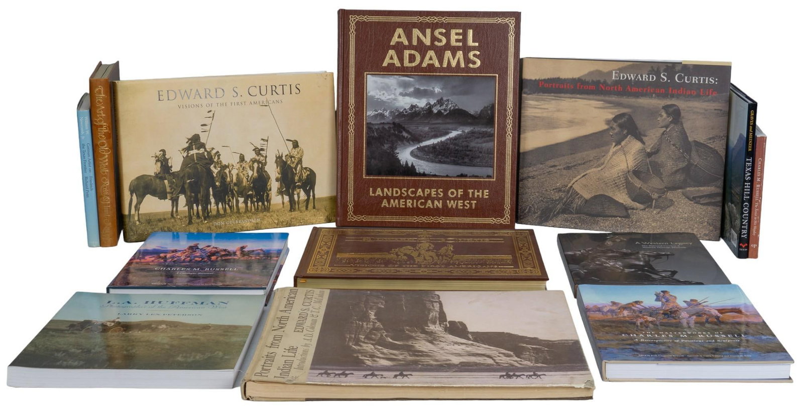 Collection of (9) Texas and Western Art Books: Collection of nine Texas and western art books, includes titles such as "A Western Legacy", "The Masterworks of Charles M. Russell", and "Ansel Adams Landscapes of the Northwest