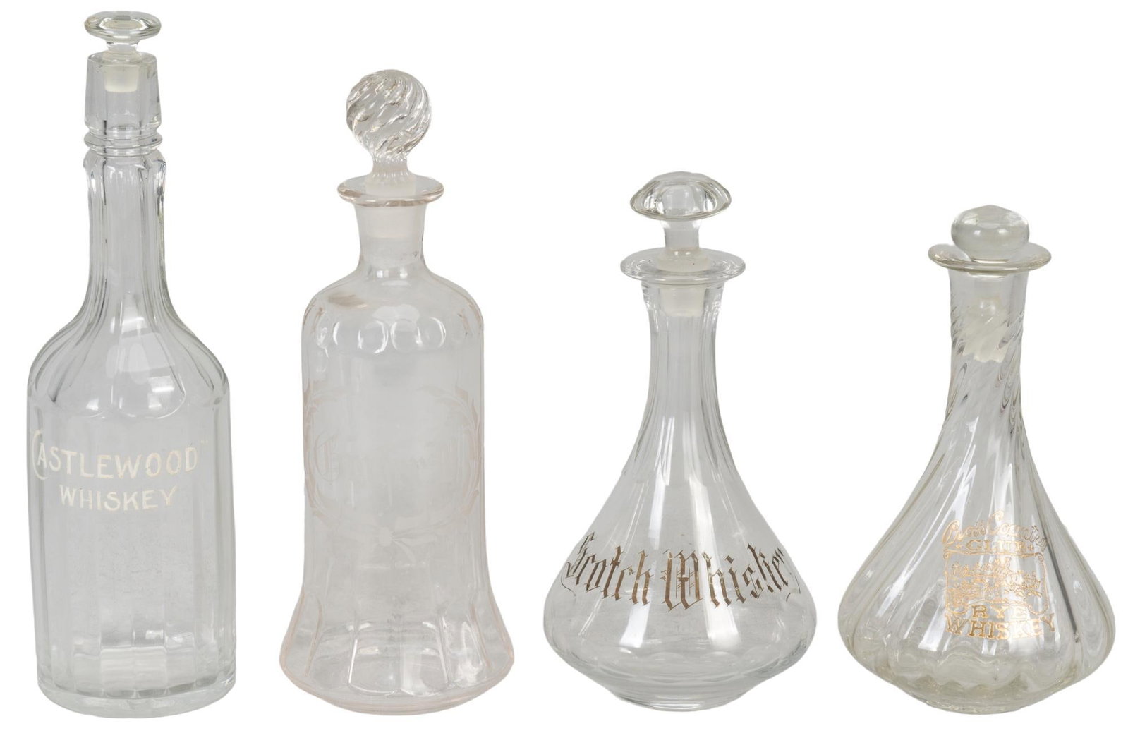 Collection of (4) Early 1900s Saloon Glass Beer Back Bottles: Collection of four early 1900s saloon glass beer back bottles, includes Castle wood Whiskey bottle, Cross Country Club rye whiskey bottle, and two other bottles with inscriptions, each one comes with 
