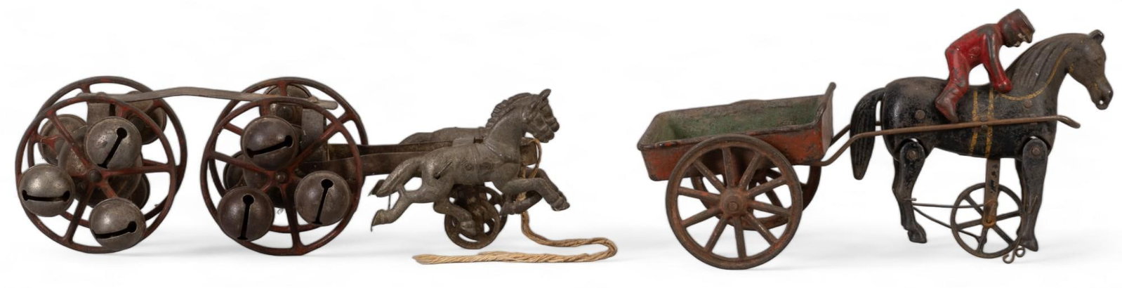 Vintage Cast iron Toys: Pair of vintage cast iron toys height 3.5 in. x width 4.5 in. x depth 11.5 in. Provenance: Property from the estate of a San Antonio, Texas gentleman Shipping available for this lot through our partne