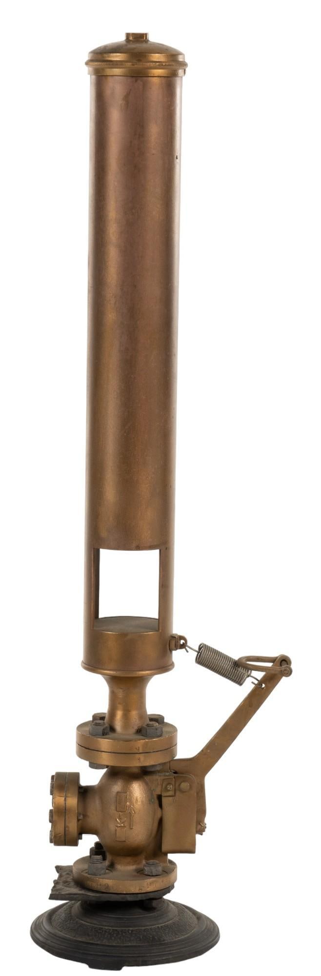 Brass Steam Whistle: Vintage brass steam whistle with copper toned finish, on black metal base, marked above base "WTP 20, 21 - 66" height 46 in. x width 12 in. x depth 9 in. Provenance: Property from the monument