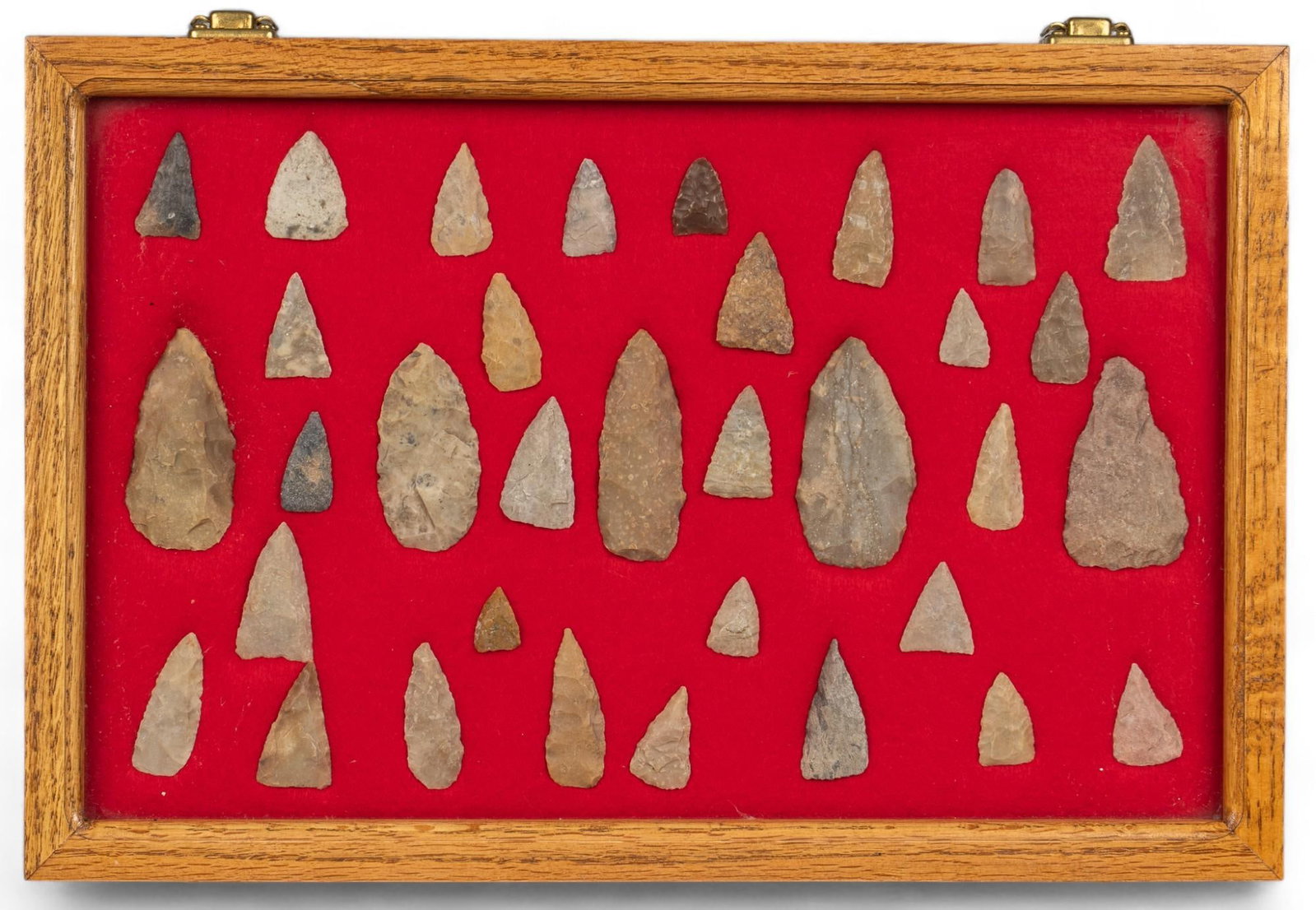 Framed Collection of Projectile Points: Framed collection of projectile points height 12 in. x width 18 in. x depth 2 in. Provenance: Property from the monumental lifetime collection of a distinguished Dallas, Texas business leader and ranc