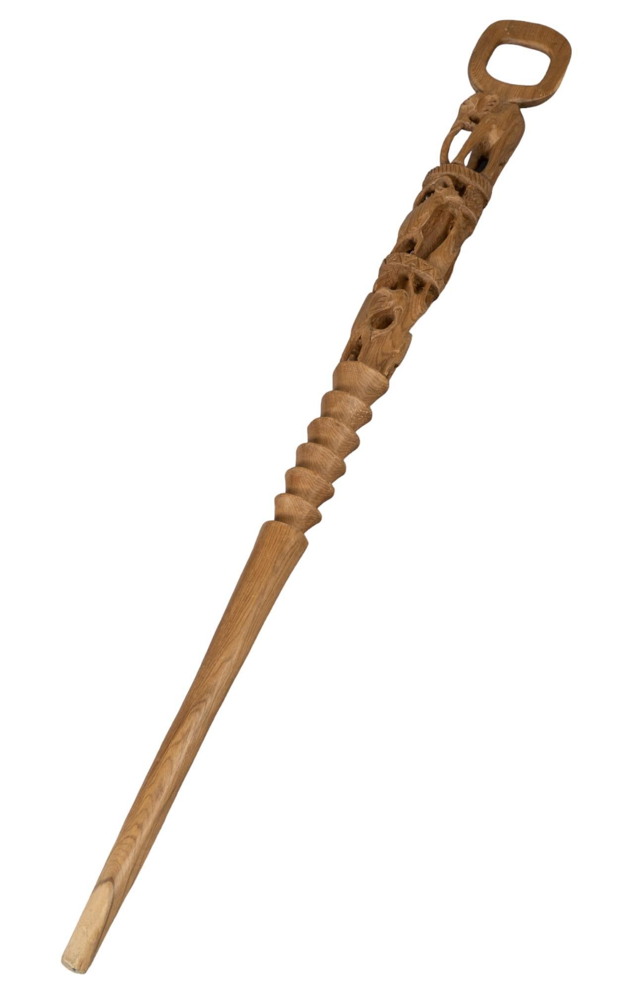 Carved Walking Stick: Carved walking stick featuring zoomorphic figures, including elephant and antelope motif height 39.5 in. x width 4 in. x depth 2 in. Provenance: Property from the monumental lifetime collection of a d