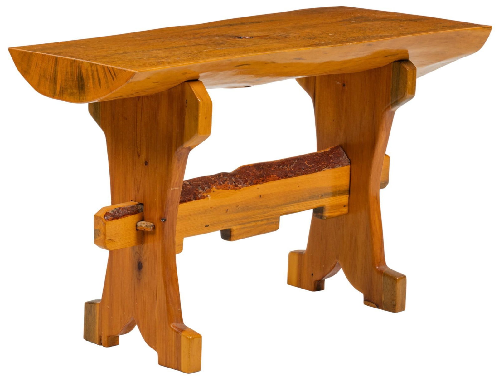 Ranch Style Bench: Ranch style bench featuring bisected wooden log seat, supported on planar trestle legs with stretcher with organize edge height 30 in. x width 50 in. x depth 22 in. Provenance: Property from the monum