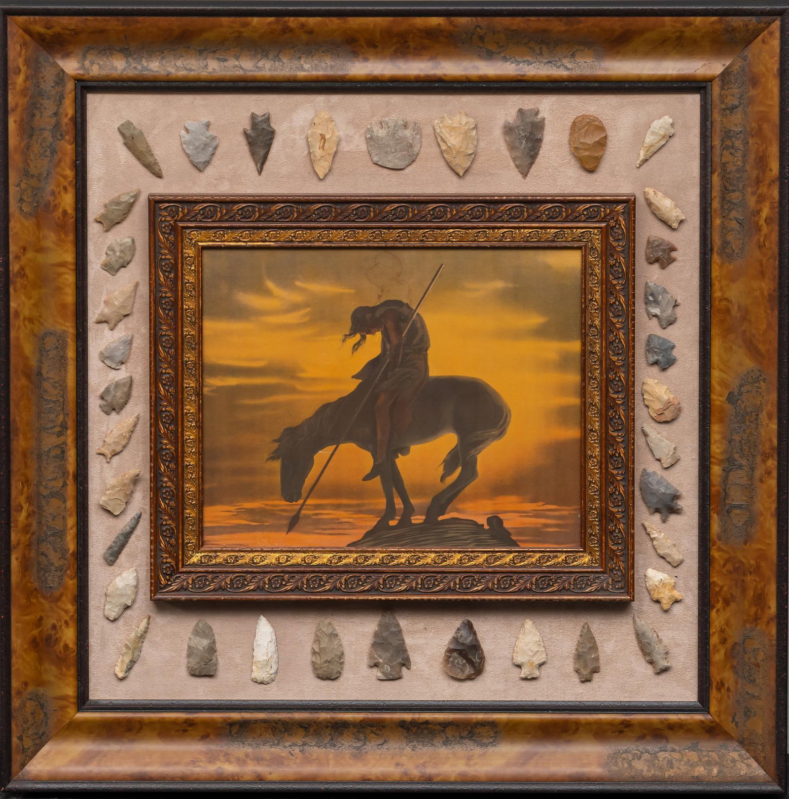 Projectile Points with Vintage Lithograph: Collection of stone projectile points framed with vintage lithograph of Frasier's "End of the Trail" sight: 12 x 15 in., frame: 30.5 x 30.5 in. Condition: Some moisture damage present to l