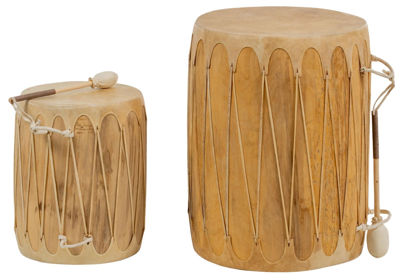 (2) Primitive Drums: One large, and one small primitive style drums, of wood and animal hide, includes on small drum stick of leather and wood, both marked "Joe Duran, San Juan Pue, N.M" height 23.5 in. x width 1