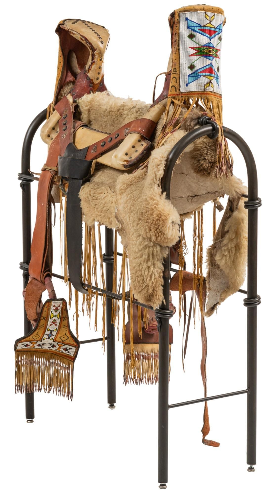 Native American Beaded Saddle, Blanket and Stand: Native American style beaded saddle, blanket, and stand, beaded and animal hide accents with leather straps, metal stand height 37 in. x width 29 in. x depth 16 in. / saddle height 36.5 in. x width 12