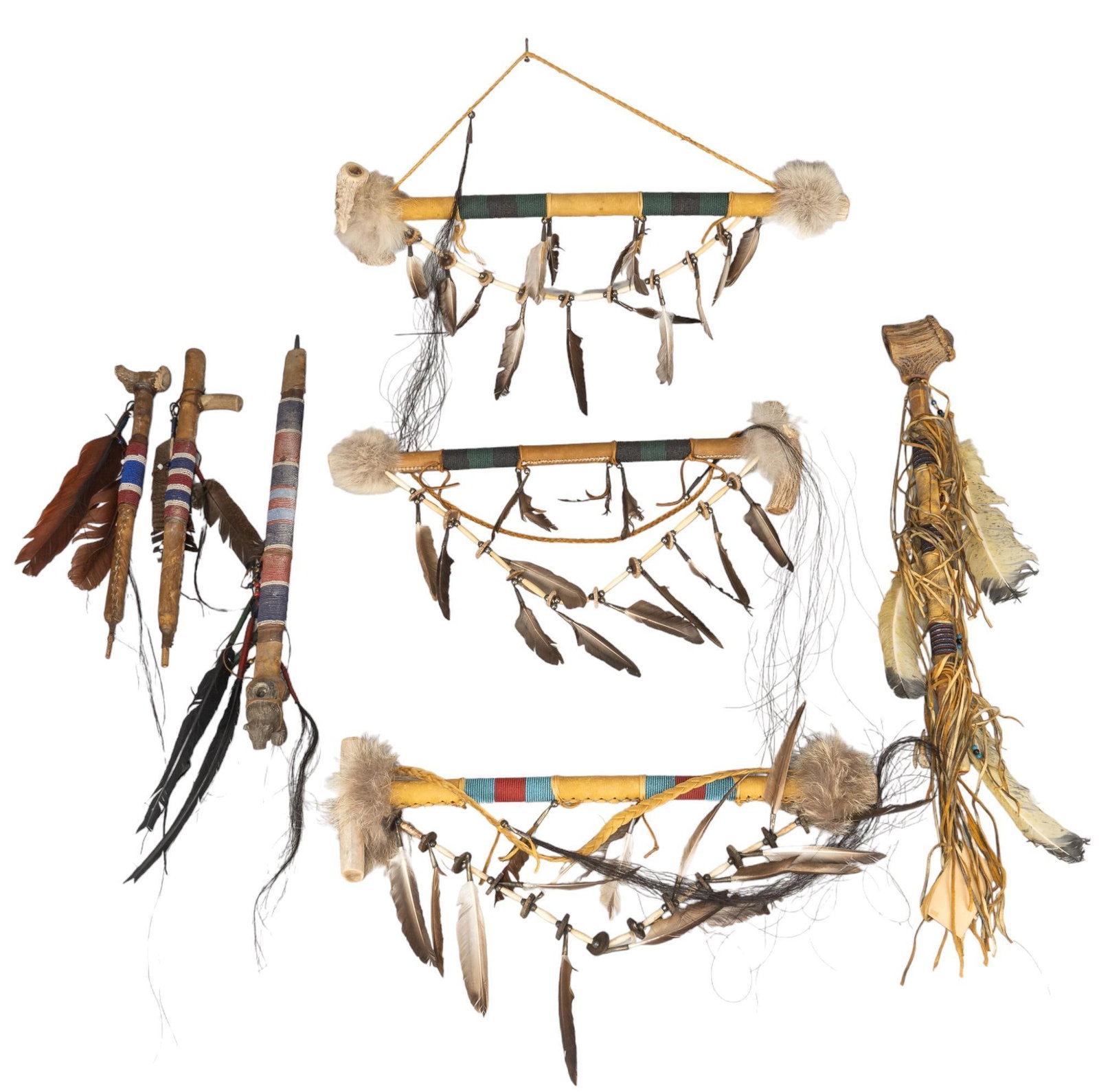 Collection of (6) Native American Style Pipes with (2) Peace Pipes: Collection of six Native American style pipes with two peace pipes, includes one small pipe with antler mouth piece and beads, one pipe with antler mouth piece, feathers, and bead work, one pipe with 