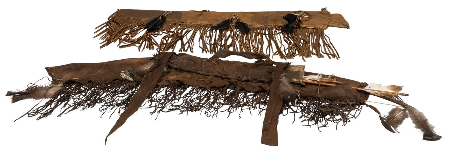 Set of (2) Leather Quivers and Bow: Set of two leather quivers and one bow, one quiver has feathers, fringe, and bone accents, one quiver is suede with fringe and comes with two arrows and a wooden bow height 56 in. x width 12 in. x de