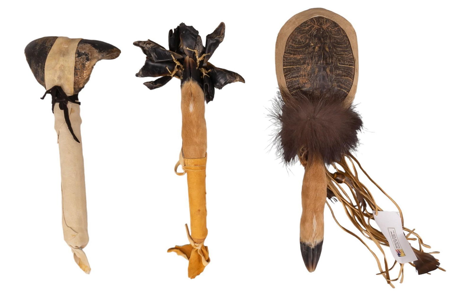 Collection of (3) Native American Rattles: Collection of three Native American rattles, includes turtle shell rattle with deer hoof and authenticity certificate, dual hook and leather rattle, deer hoof handle with several hanging deer hoof sha